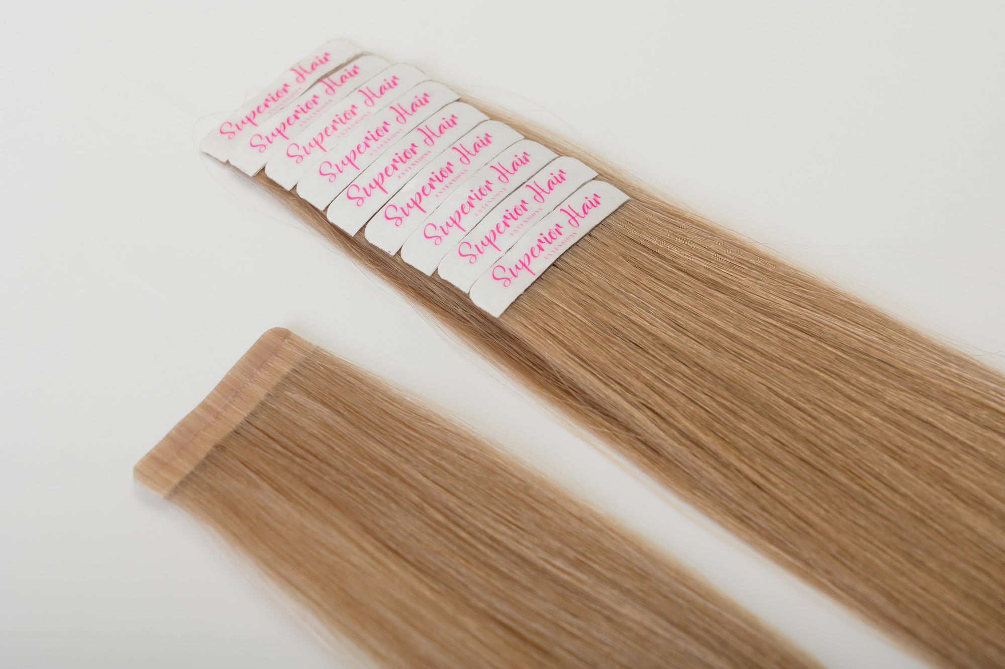 rollover-image. #16 Caramel Dark Blonde Ultra Seamless Tape In Extensions. Superior Hair Extensions.