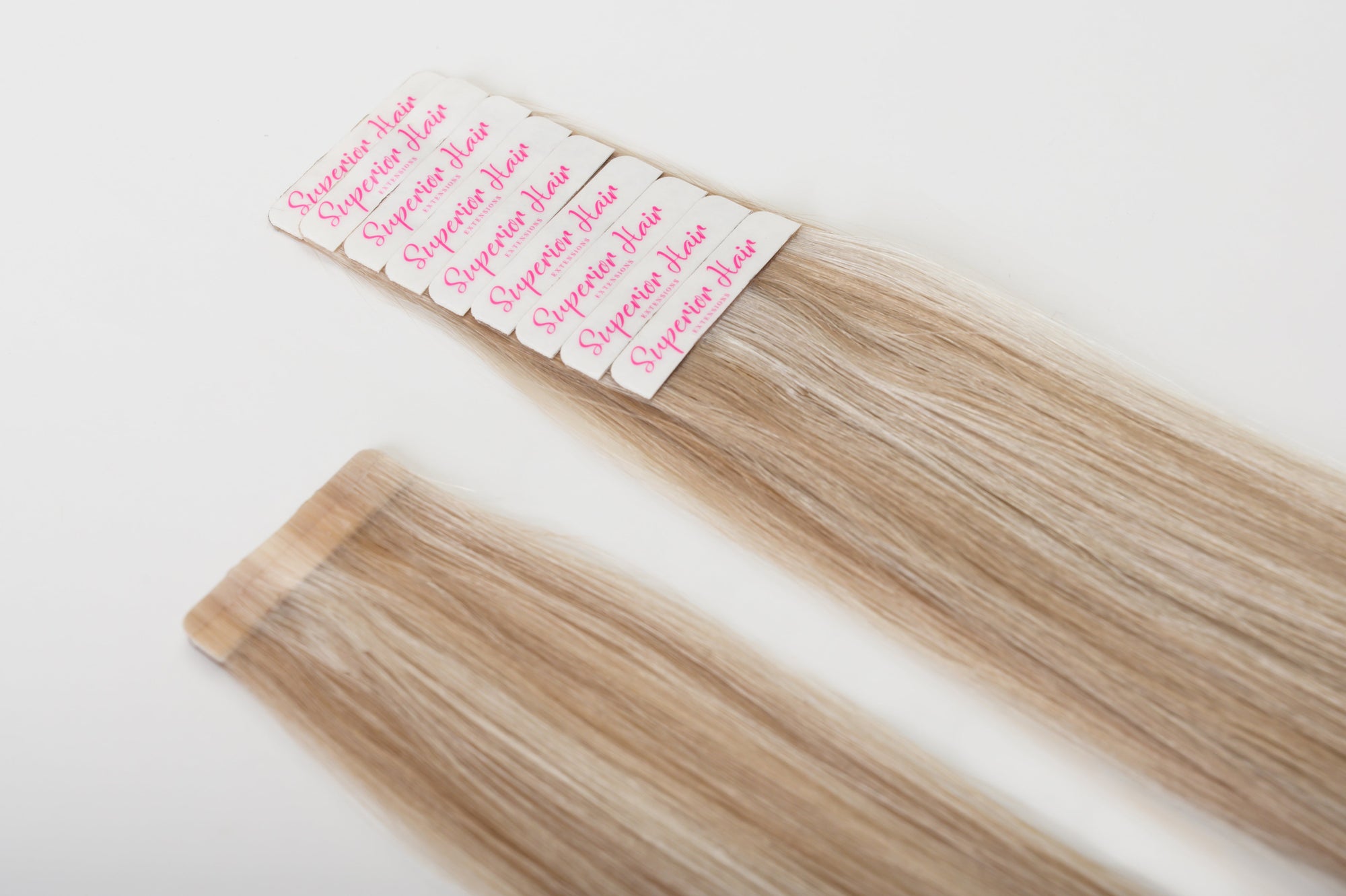 rollover-image. #18/60 Pearl Ash Blonde Highlights Ultra Seamless Tape In Extensions. Superior Hair Extensions.